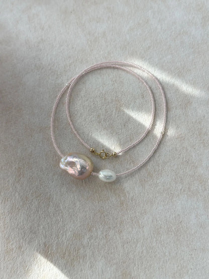 Loop display of the fairy pink pearl necklace showcasing the 14K gold filled clasp.