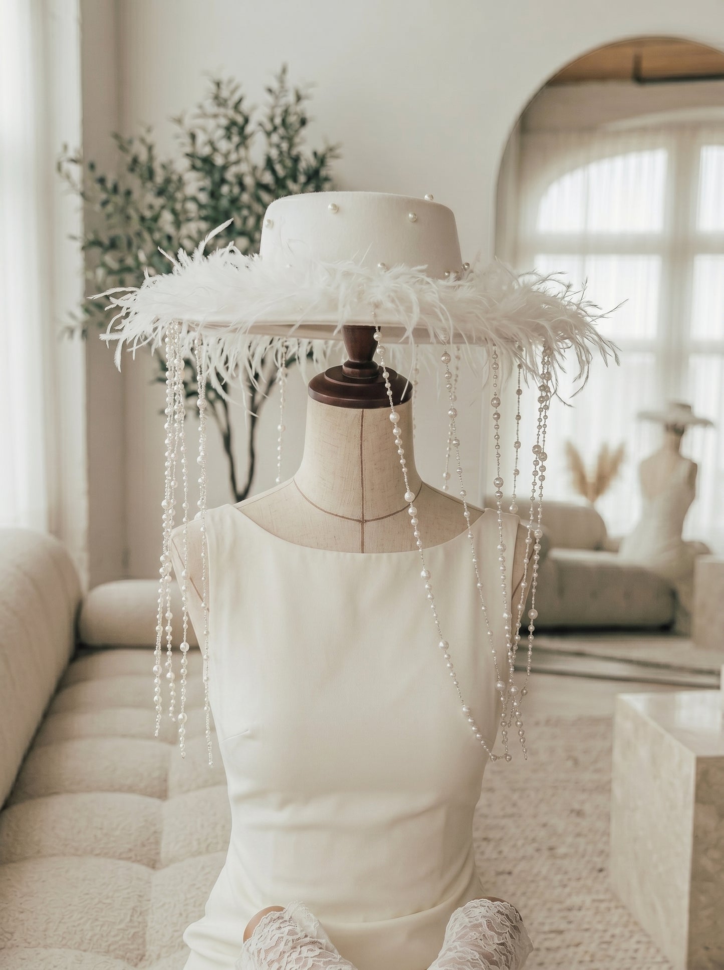 Avant-Garde Wide-Brim Bridal Fascinator Hat - Structured Off-White Wedding Cap with Shimmering Pearl Strands and Fluffy Feathers  LUNA-X198