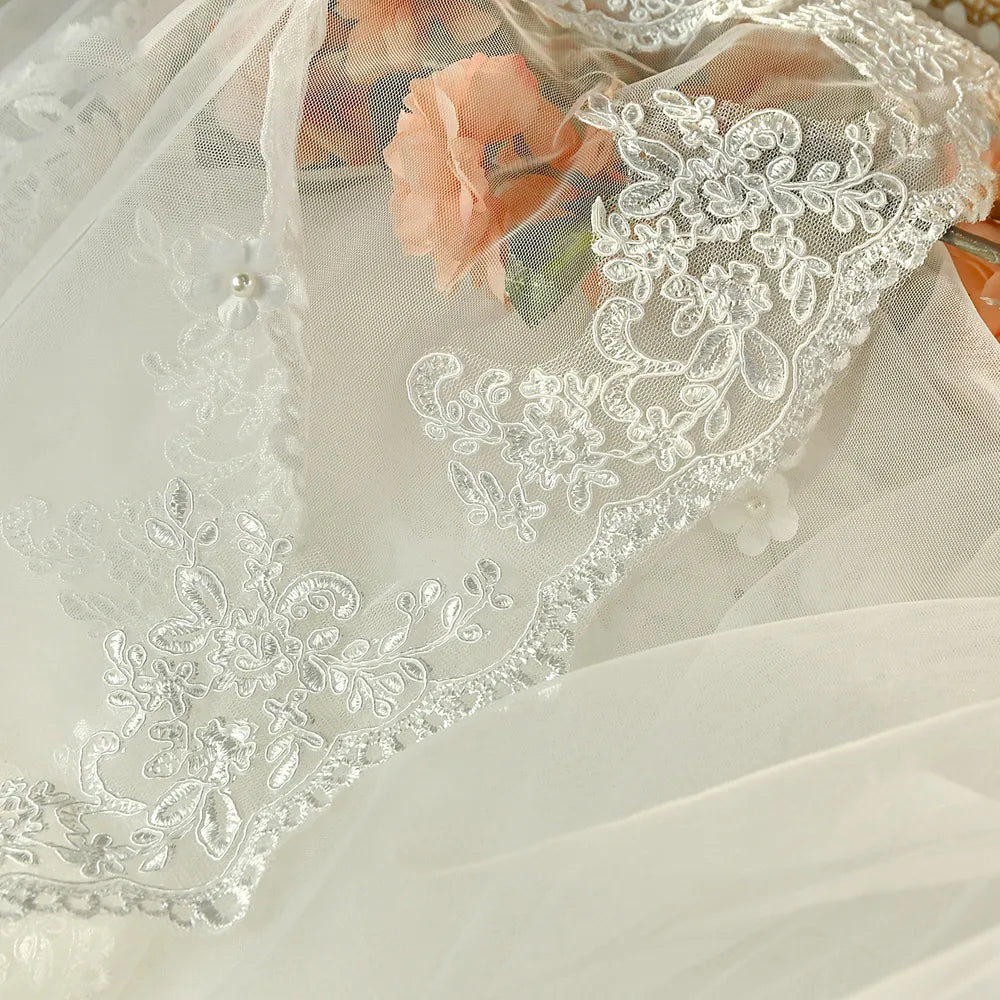 High-definition shot showcasing detailed stitchwork along scalloped lace trim
