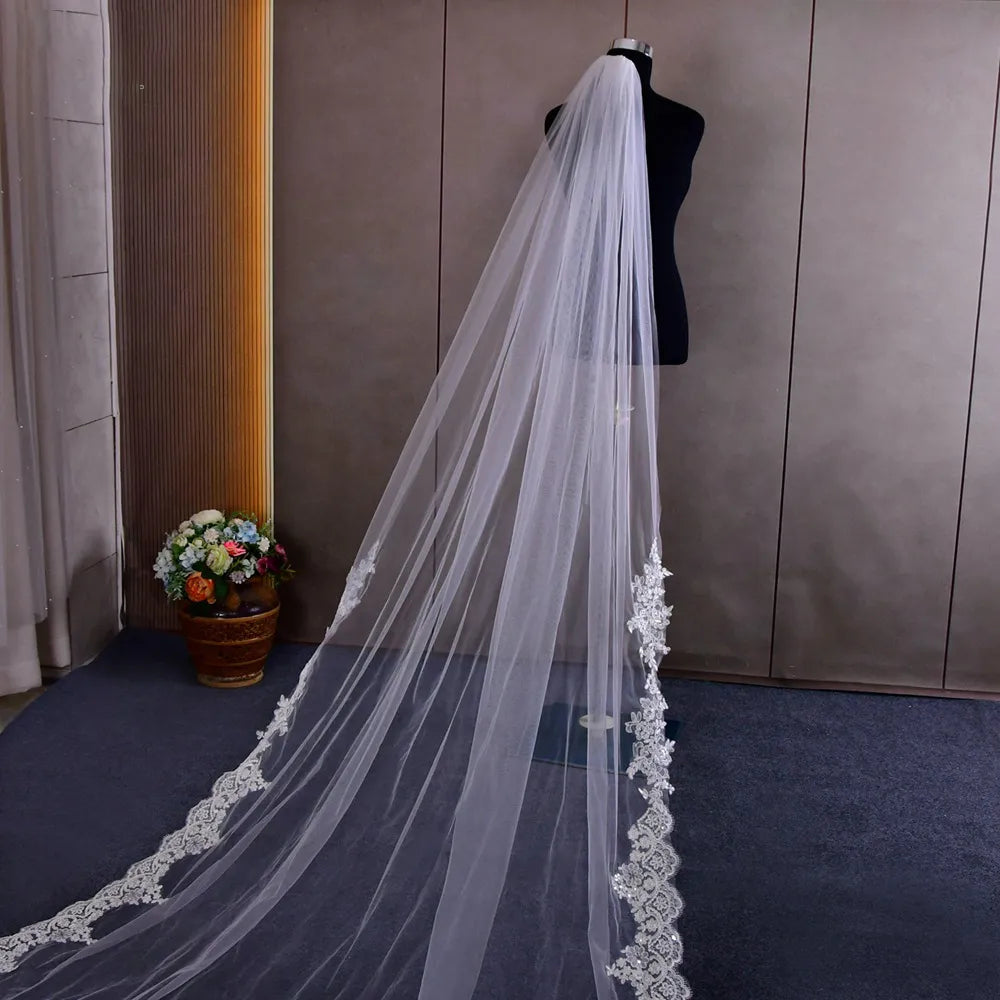 Light passing through smooth soft white tulle emphasizing fine mesh clarity and romantic drape