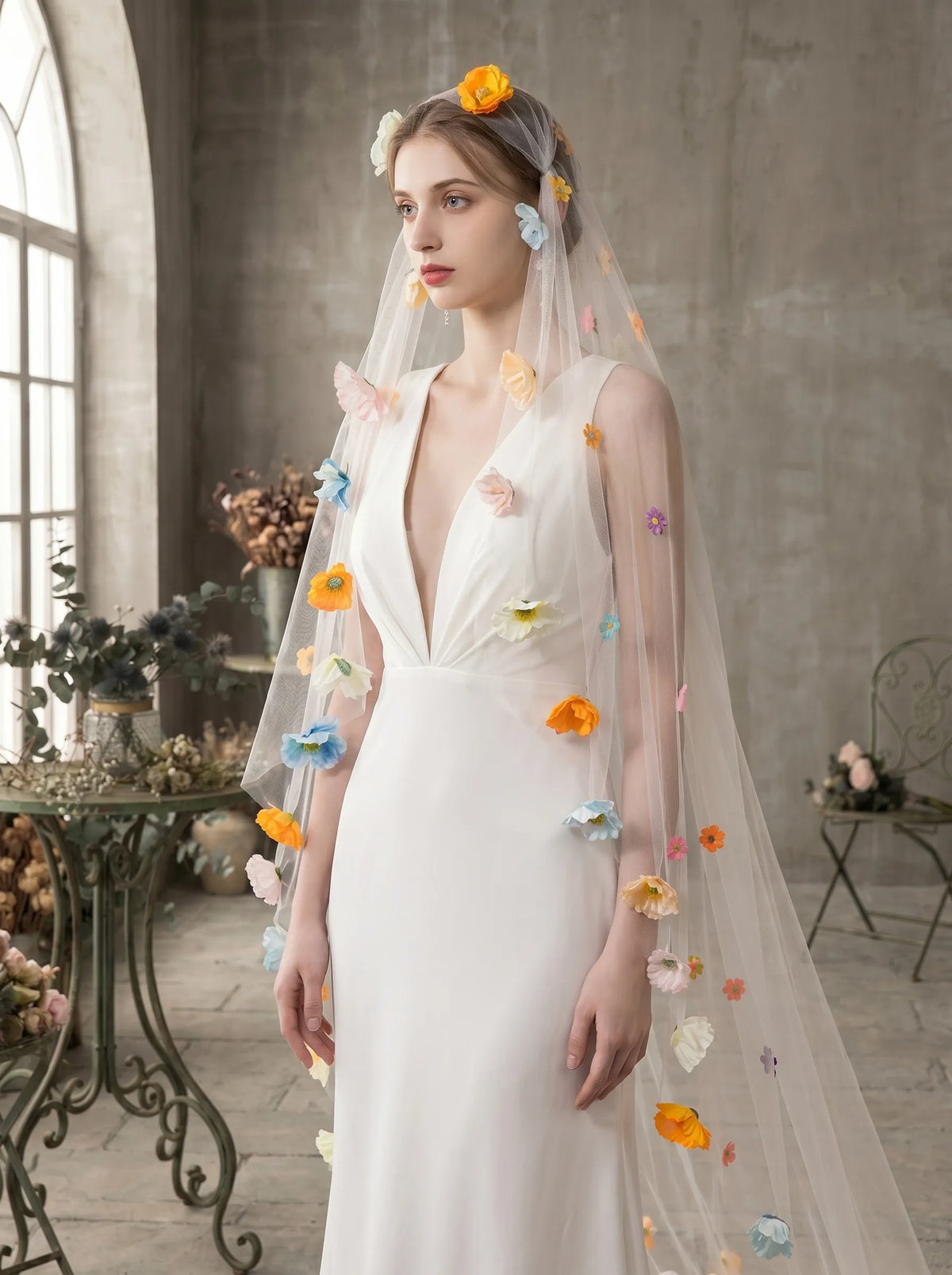 cottagecore bride wearing botanical wedding veil outdoors