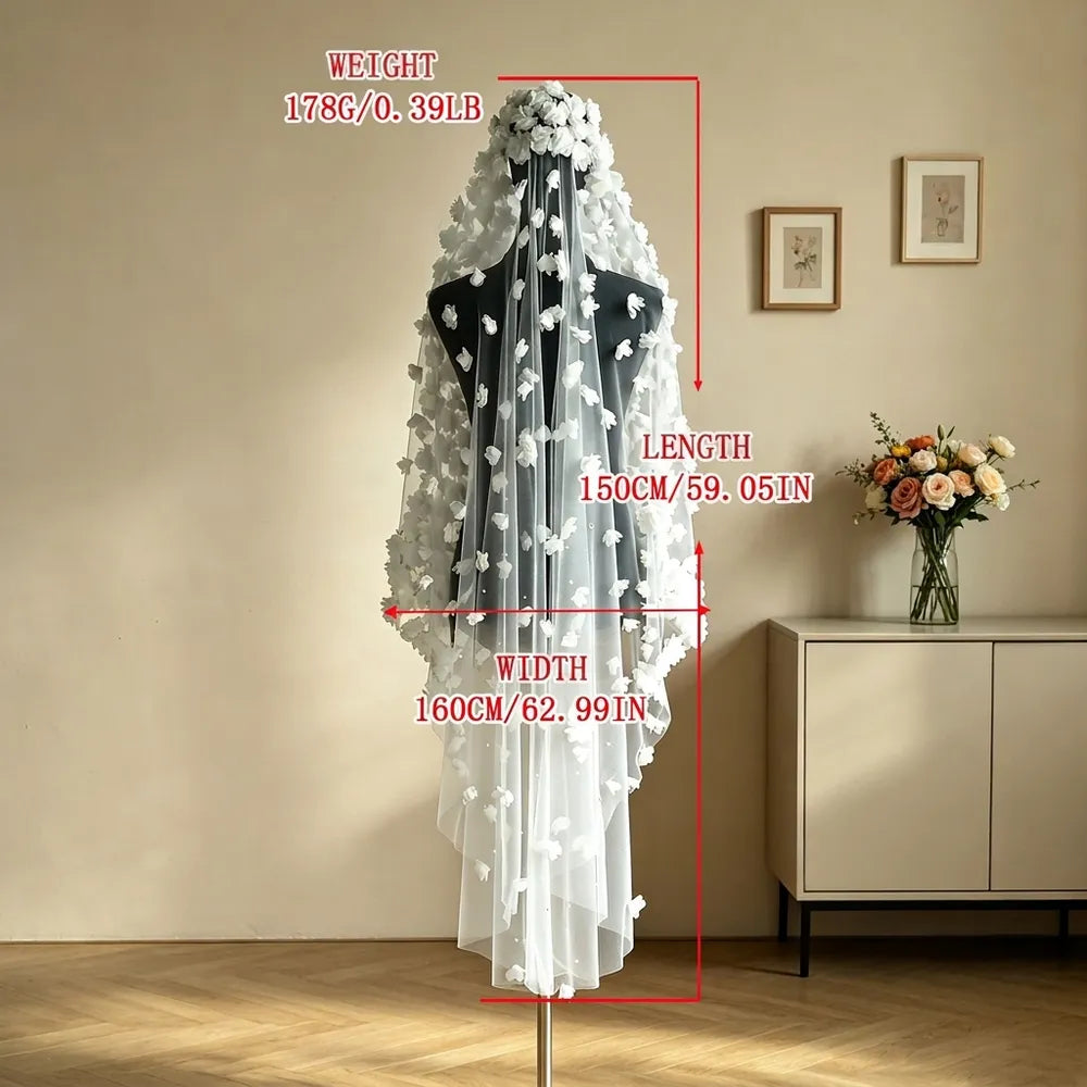 Front perspective of mannequin showing 3D chiffon floral veil cascading down the sides over sheer tulle