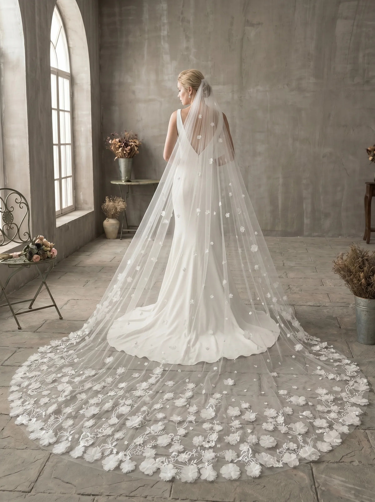 long cathedral wedding veil with cascading floral train