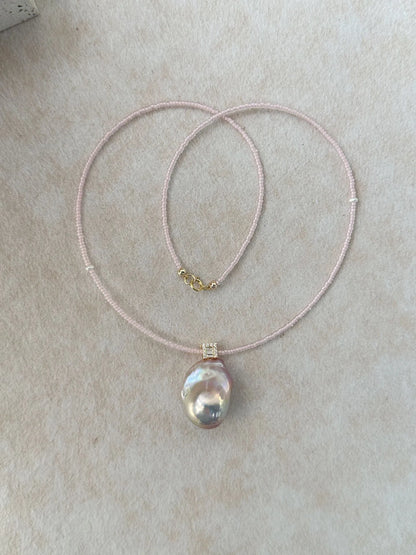 Flatlay display of the 42cm pink beaded baroque pearl necklace with 14K gold filled clasp.