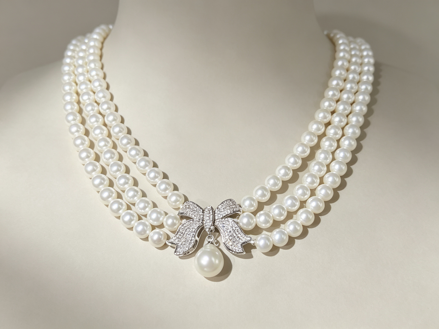 Triple-Strand Pearl & Zircon Bow Necklace – Vintage Elegance for Bridal & Evening Wear  LUNA-X136