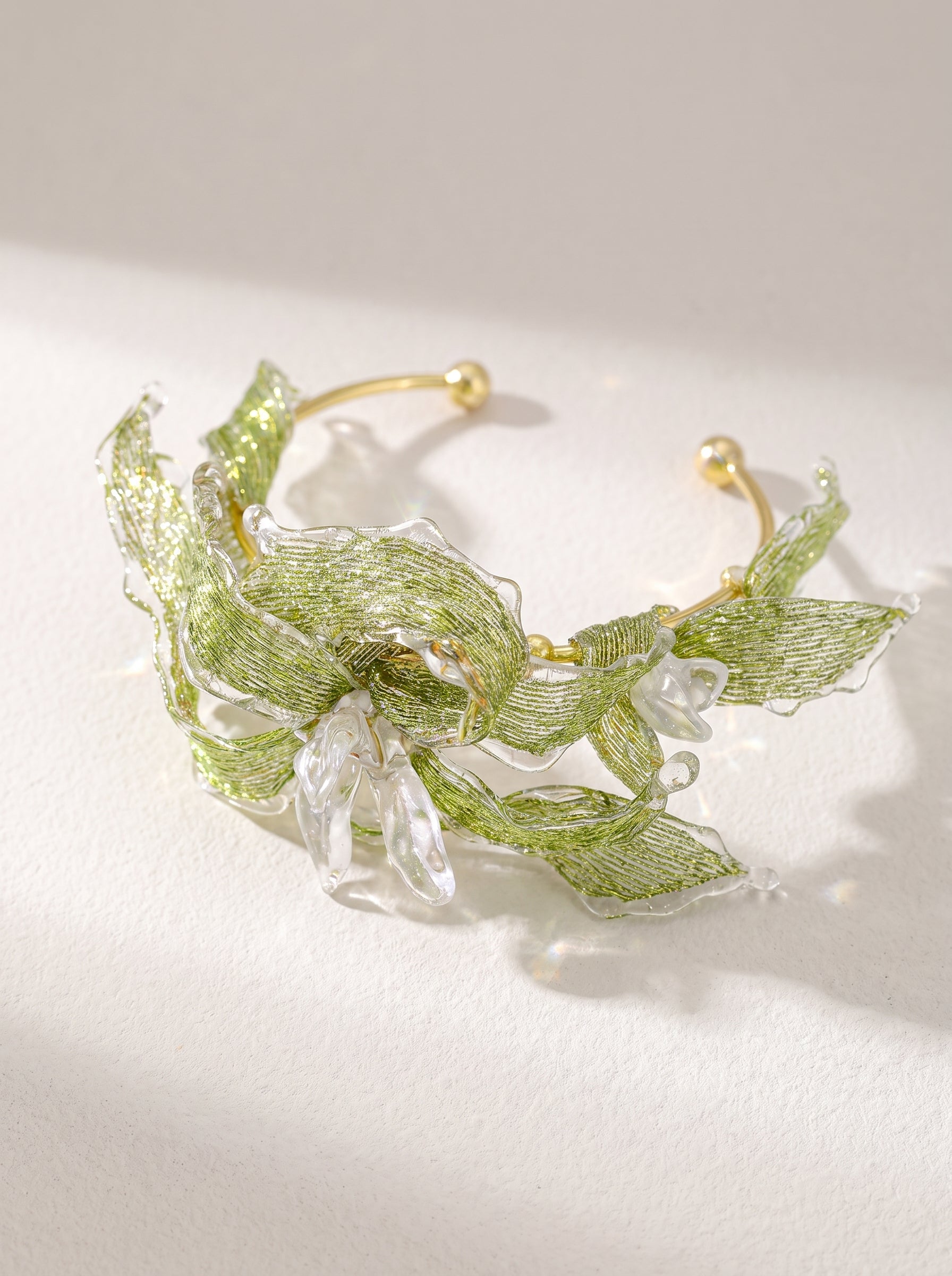 Avant-Garde Hand-Woven Metallic Leaf Cuff - Deconstructed Tender Green Vine Bangle with Clear Liquid-Ice Edges and Gold Plated Base  LUNA-X396