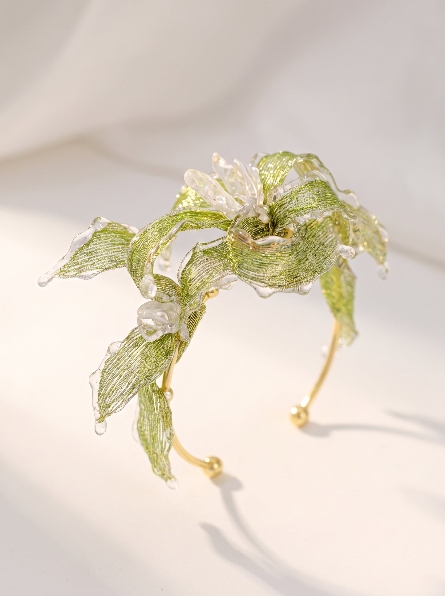 Avant-Garde Hand-Woven Metallic Leaf Cuff - Deconstructed Tender Green Vine Bangle with Clear Liquid-Ice Edges and Gold Plated Base  LUNA-X396