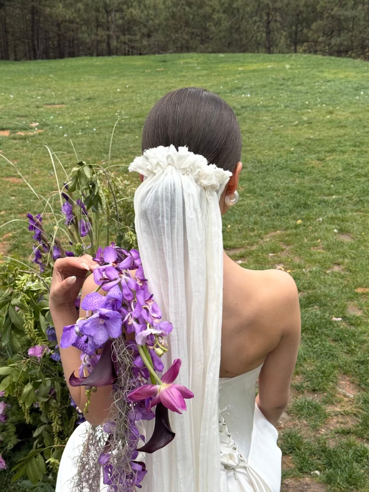 floor-sweeping bridal veil with ruffled headband