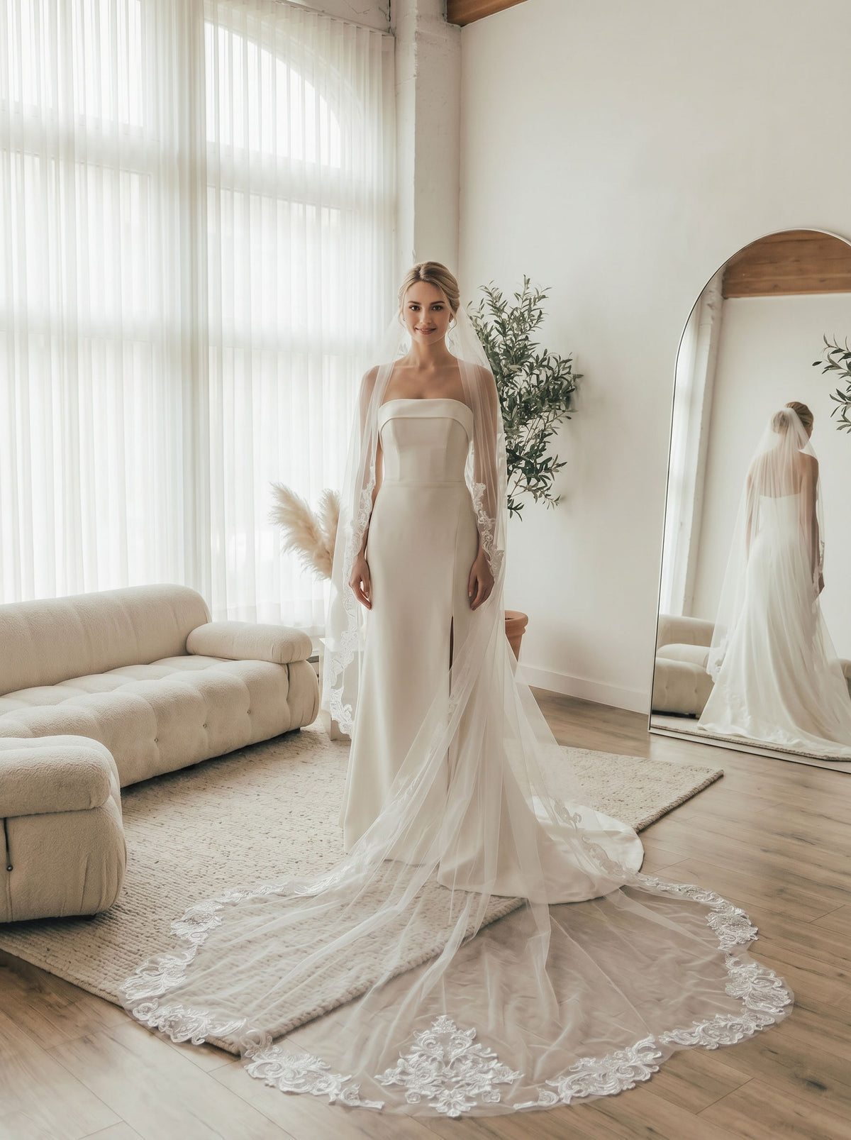 Ornate lace border cathedral wedding veil with central floral applique, long trail sheer soft tulle elegant bridal veil