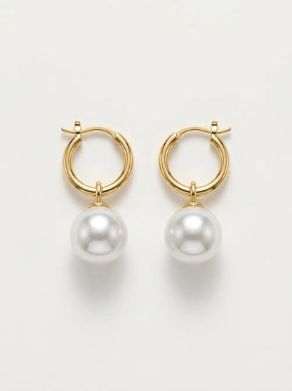Front flatlay view of a pair of 18k gold-plated S925 sterling silver crystal baroque pearl huggie hoop earrings.