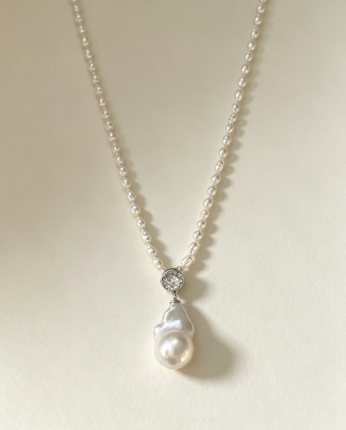 Elegant baroque freshwater pearl pendant necklace with cubic zirconia accent