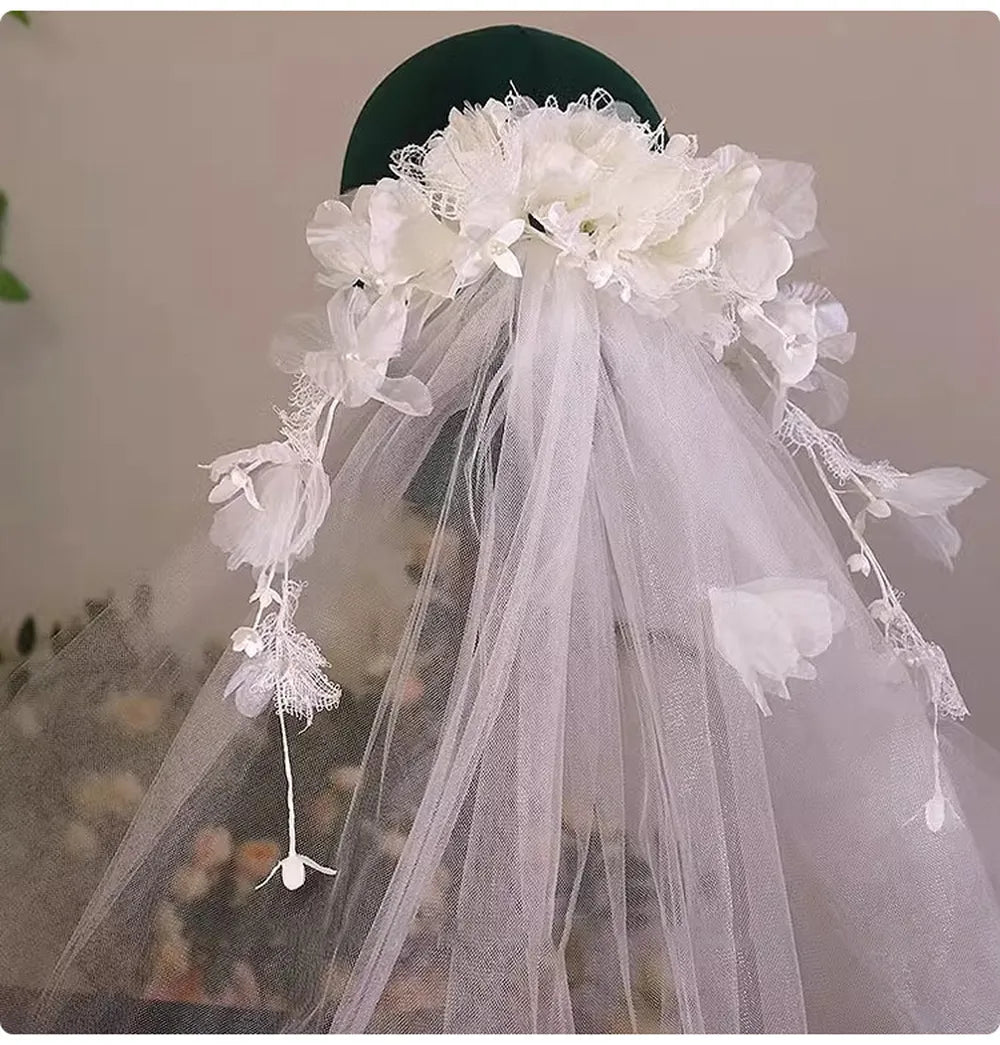 Side view of romantic 3D floral halo bridal veil on a display mannequin