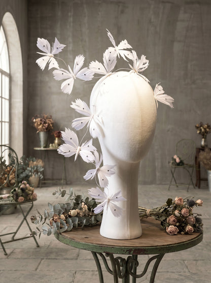 Artistic feather butterfly bridal headband, white floating butterfly hair piece for editorial wedding photoshoot