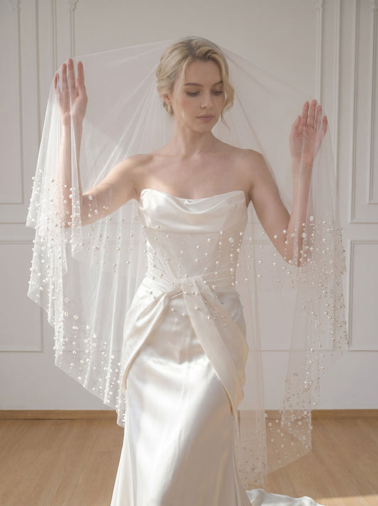 minimalist fingertip wedding veil with soft tulle drop design