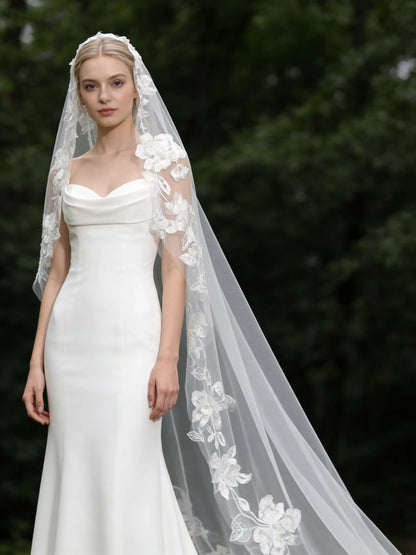 Bride wearing a 300cm cathedral lace wedding veil