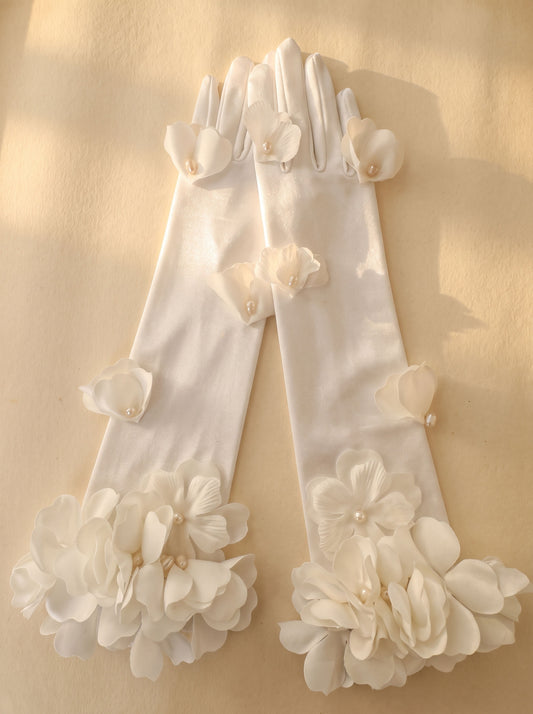 French romantic long ivory satin opera gloves with handcrafted 3D organza floral clusters and pearl petal embellishments for bridal wear.
