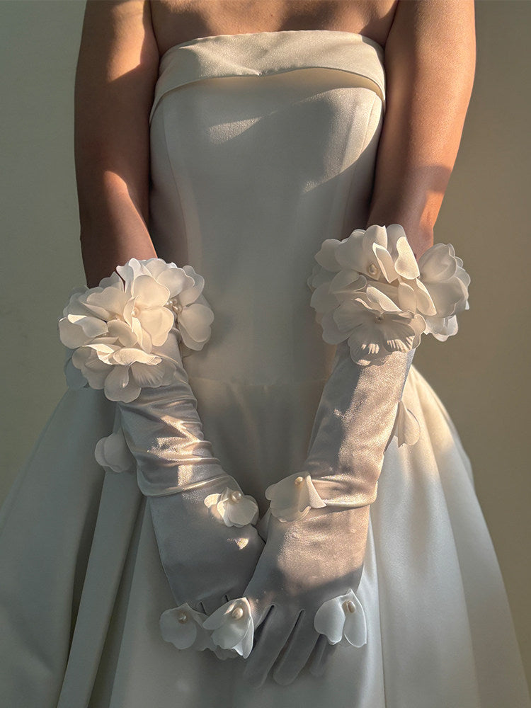 French romantic long ivory satin opera gloves with handcrafted 3D organza floral clusters and pearl petal embellishments for bridal wear.