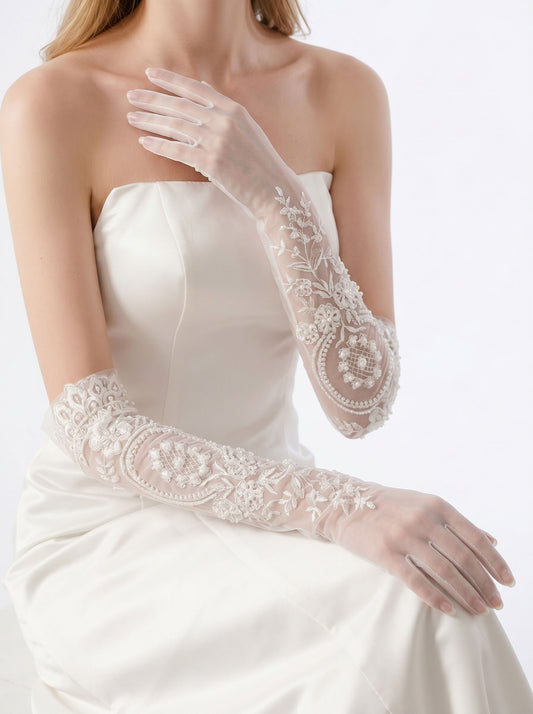 Ivory sheer tulle wedding gloves with embroidered lace appliqué and pearl details