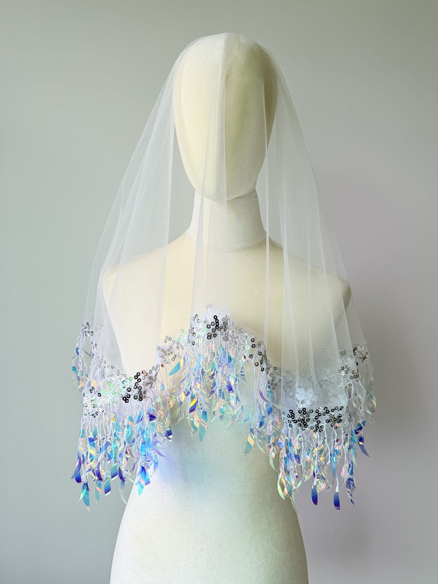 Unique bridal veil with sequin details and flowing tassel fringe