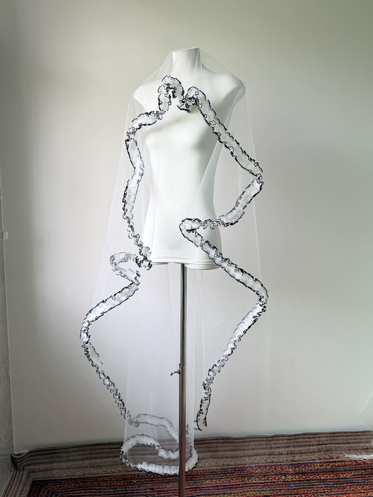 Alternative bridal veil with contrasting black edge
