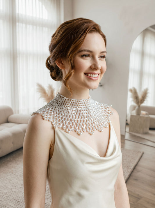 Regencycore style hand-woven bridal choker featuring precision lustrous round pearl beads cascading into a scalloped capelet drape around the neck and shoulders.
