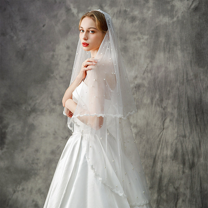 Two-layer lace edge bridal veil with scattered bead tulle details, simple elegant fingertip wedding veil for bride photography