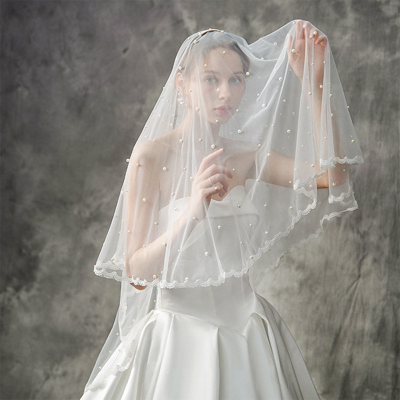 Two-layer lace edge bridal veil with scattered bead tulle details, simple elegant fingertip wedding veil for bride photography