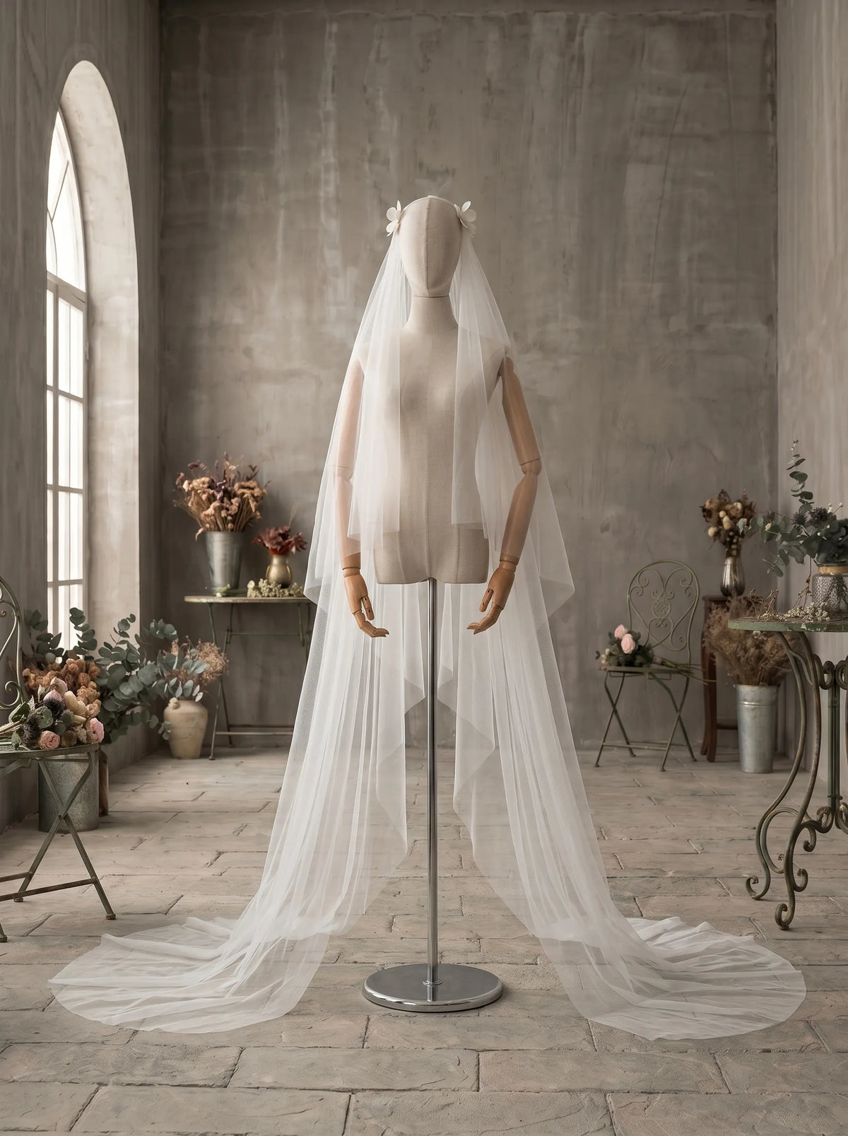 Modern minimalist single-tier cathedral length bridal veil made of high-density soft tulle, attached with handcrafted 3D white satin flower alligator clips.