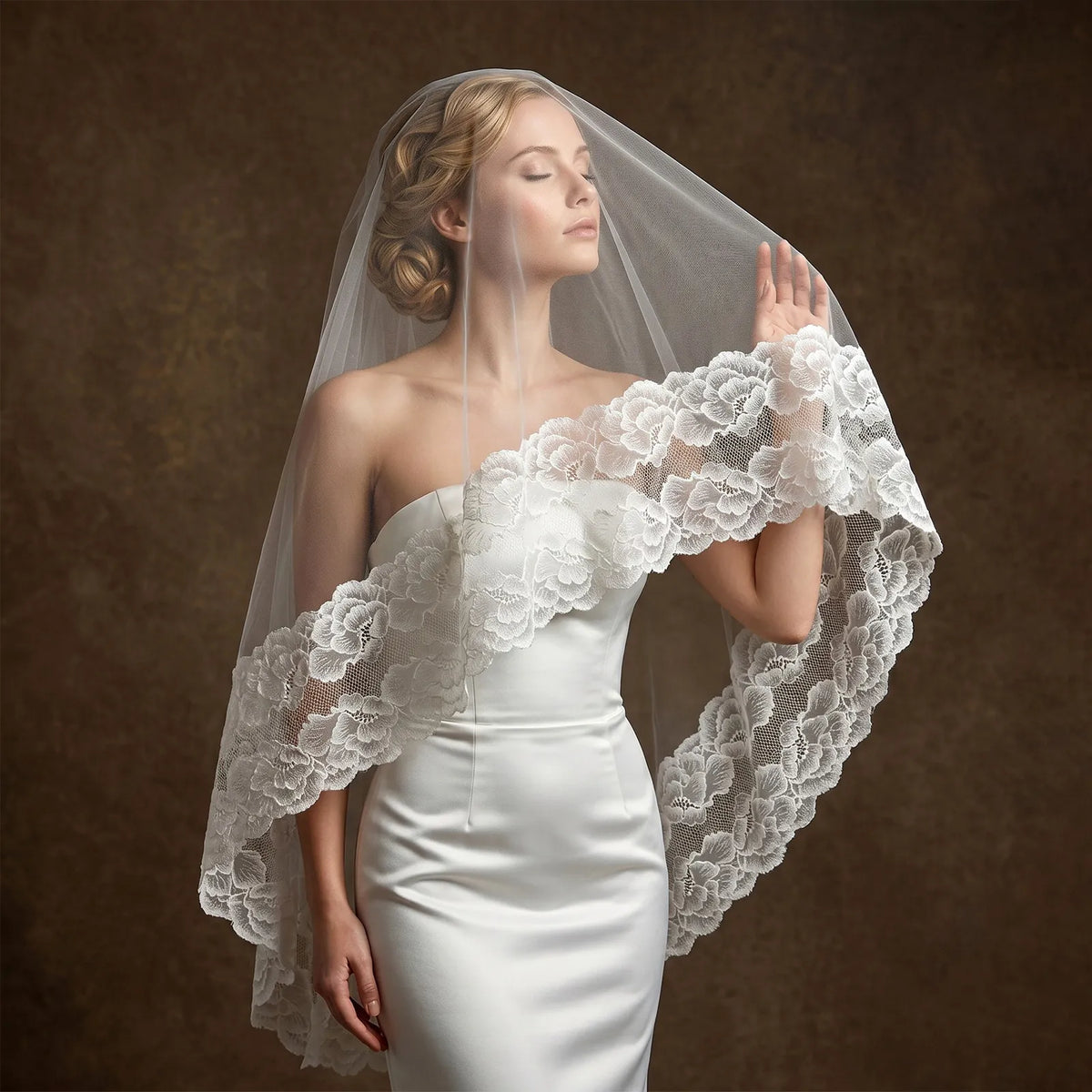 Bridal portrait with closed eyes wearing sheer blusher veil draped over head and wide scalloped lace border