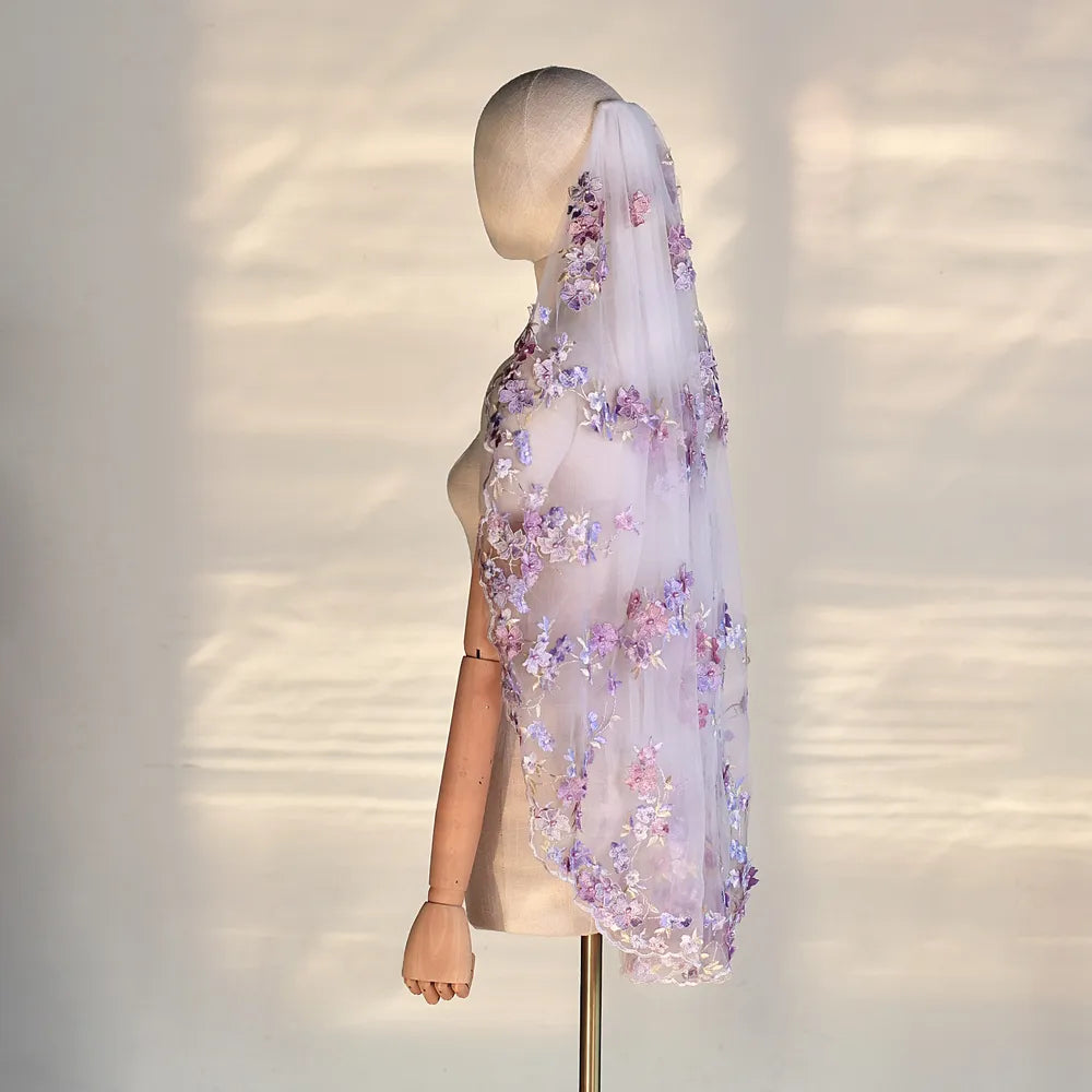 Side profile view of 100cm single-tier purple floral veil on dress form, highlighting smooth cascading sheer tulle and layered botanical lace trimming from head to hip