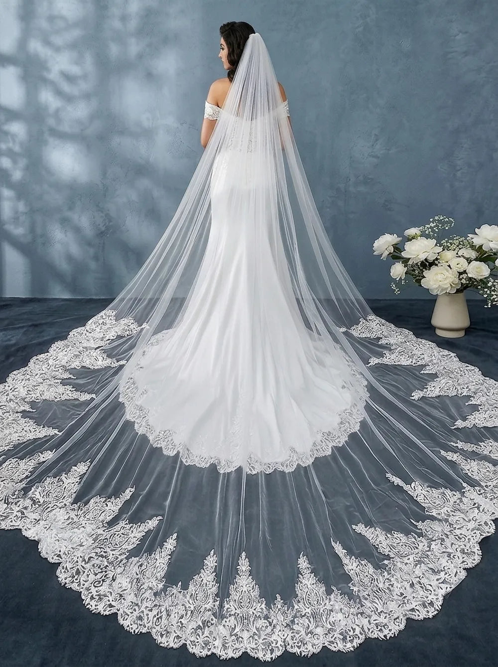 Single-tier soft white royal cathedral veil on mannequin showing 400cm extra-long length and wide lace train