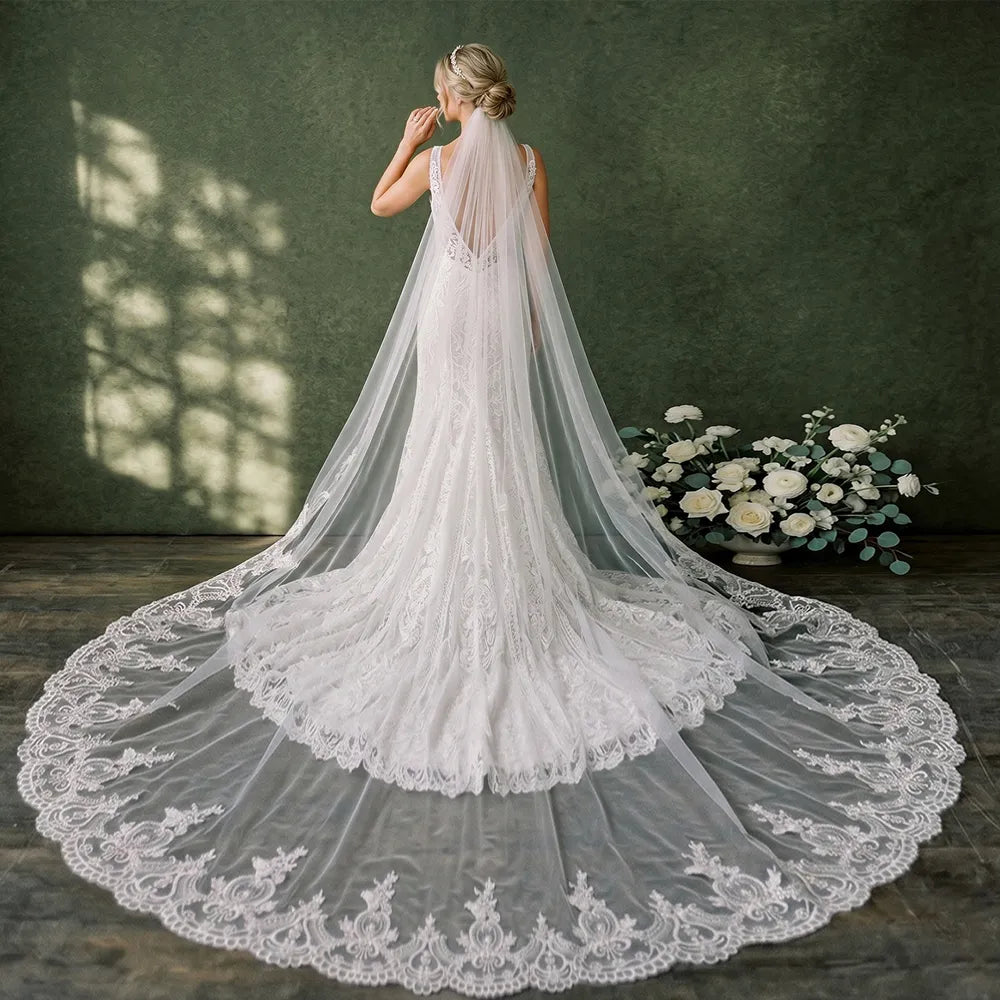 Rear view of bride walking down the aisle with lightweight 300cm cathedral train trailing gracefully