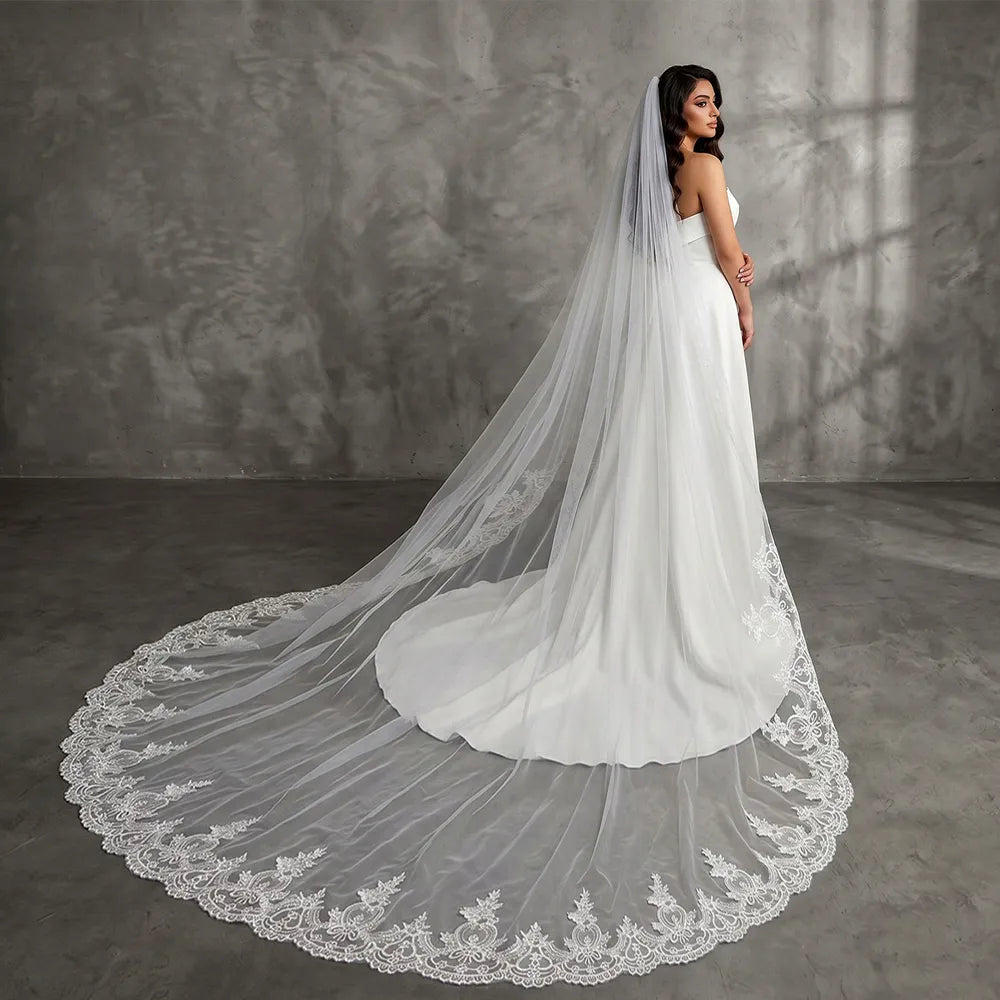 Wide angle overhead shot of 300cm fan-shaped cathedral train laid out flat to highlight lace border