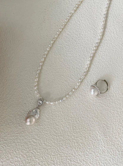 Detail of tiny seed pearl chain and solid sterling silver 5cm adjustable extension chain for pearl pendant necklace