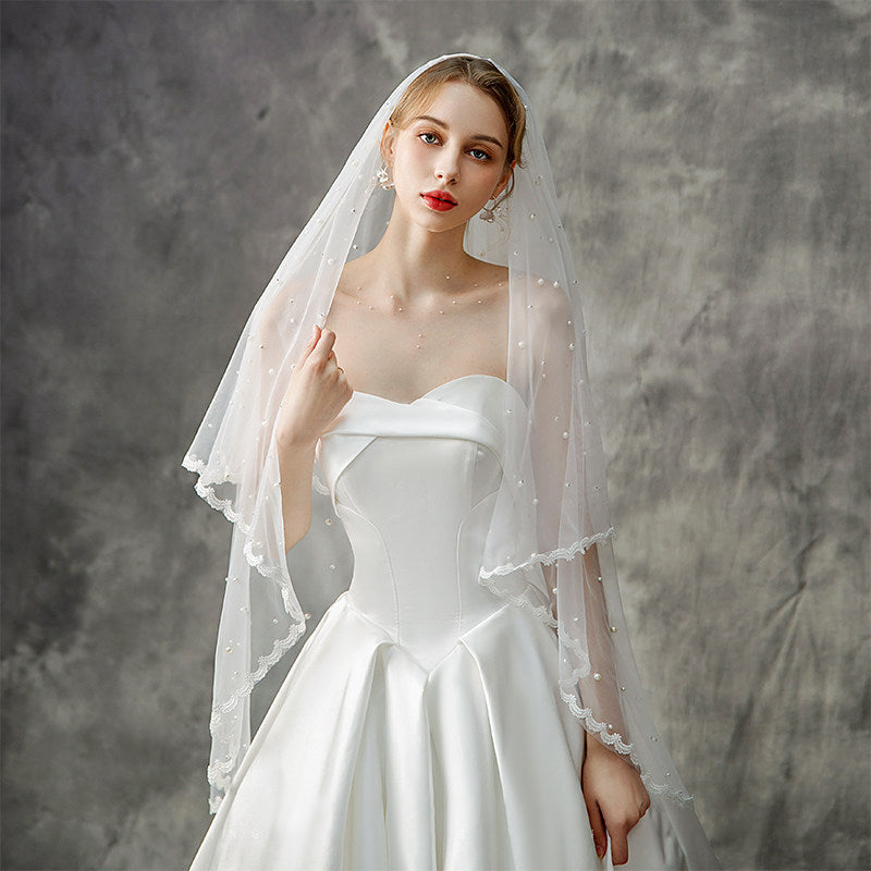Two-layer lace edge bridal veil with scattered bead tulle details, simple elegant fingertip wedding veil for bride photography