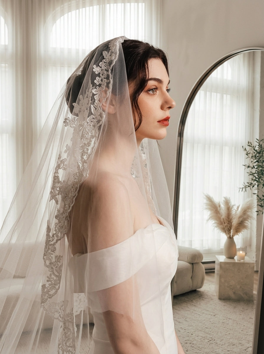 Off-white 2m two tier mid-length bridal veil with hair comb and floral lace applique trim