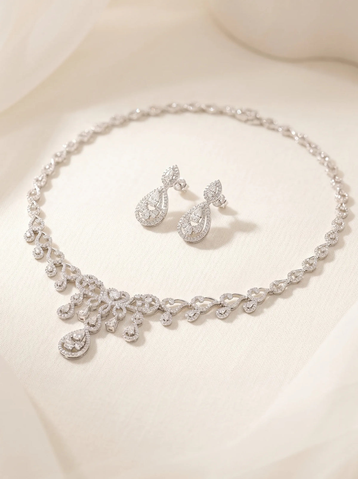 Hollow teardrop zircon bridal jewelry set with vintage lace carved necklace and double-layer drop earrings, elegant wedding accessories