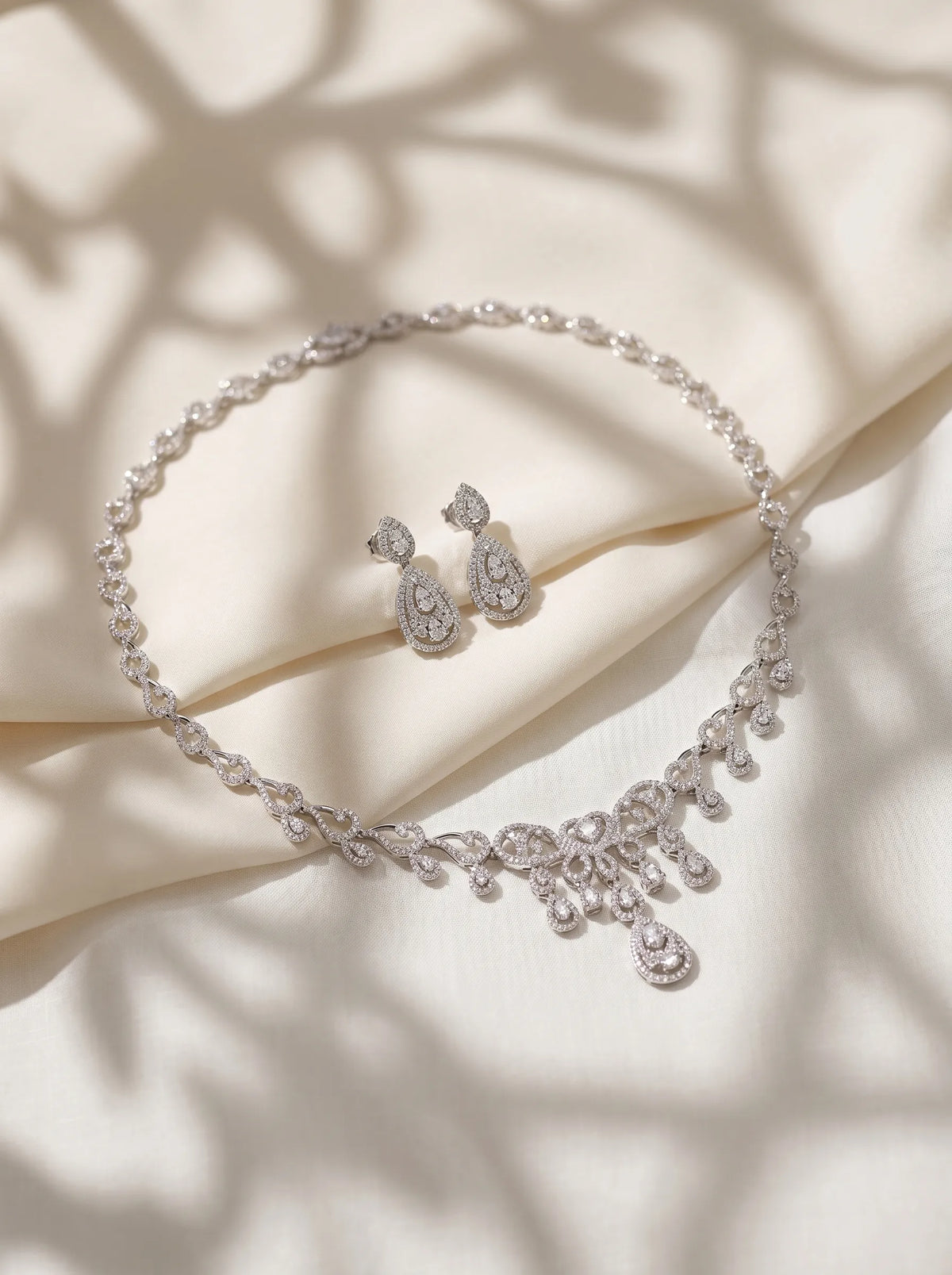 Hollow teardrop zircon bridal jewelry set with vintage lace carved necklace and double-layer drop earrings, elegant wedding accessories