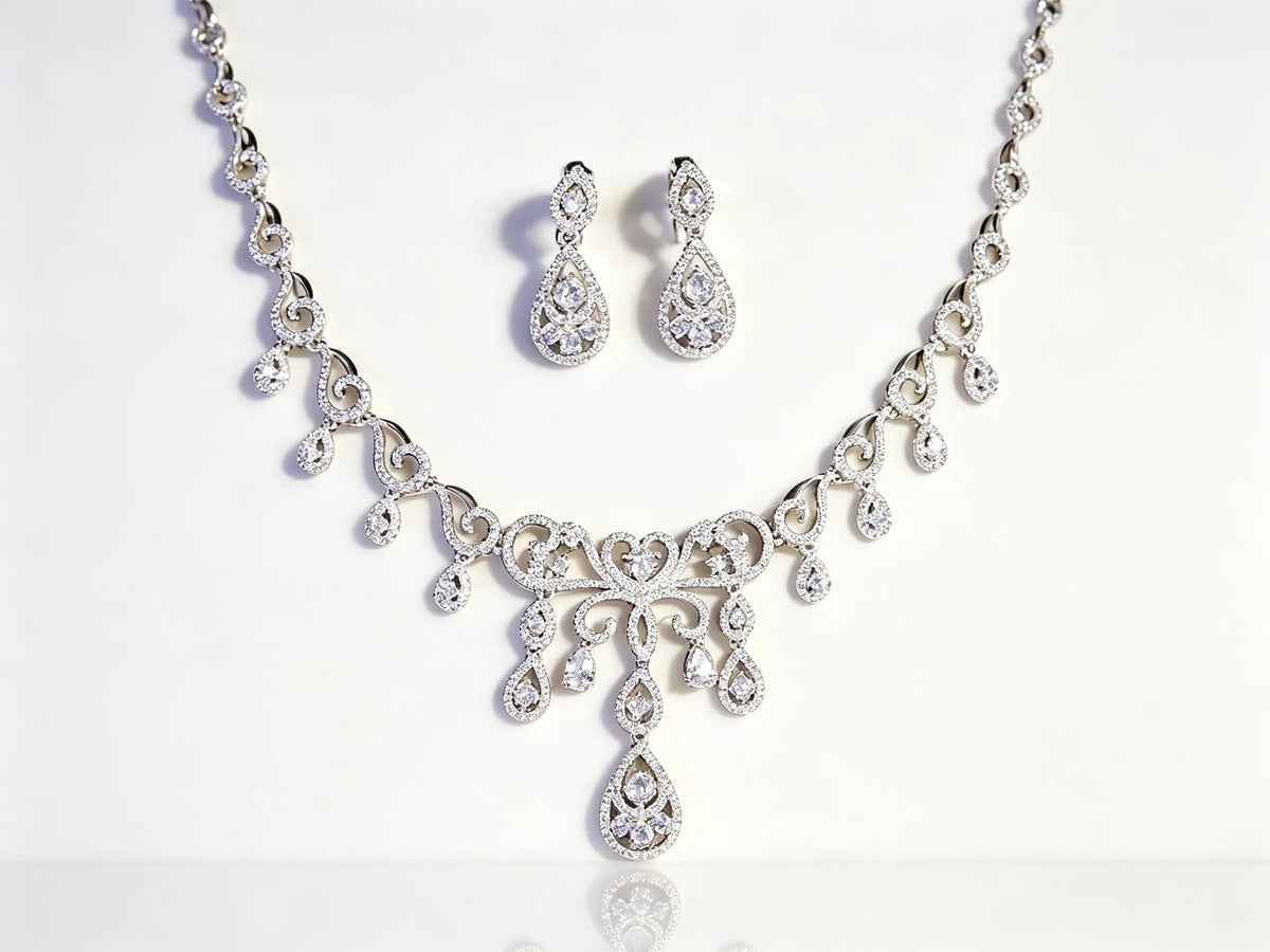 Hollow teardrop zircon bridal jewelry set with vintage lace carved necklace and double-layer drop earrings, elegant wedding accessories