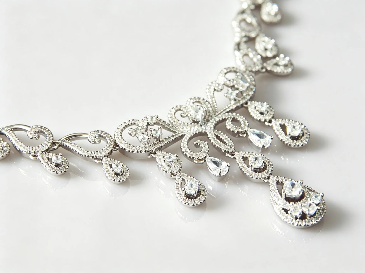 Hollow teardrop zircon bridal jewelry set with vintage lace carved necklace and double-layer drop earrings, elegant wedding accessories